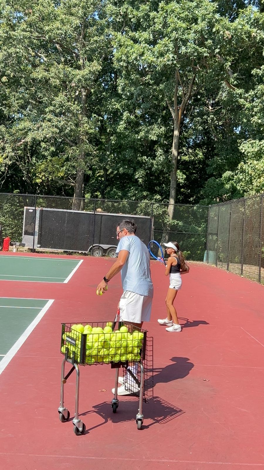 Junior players training on court