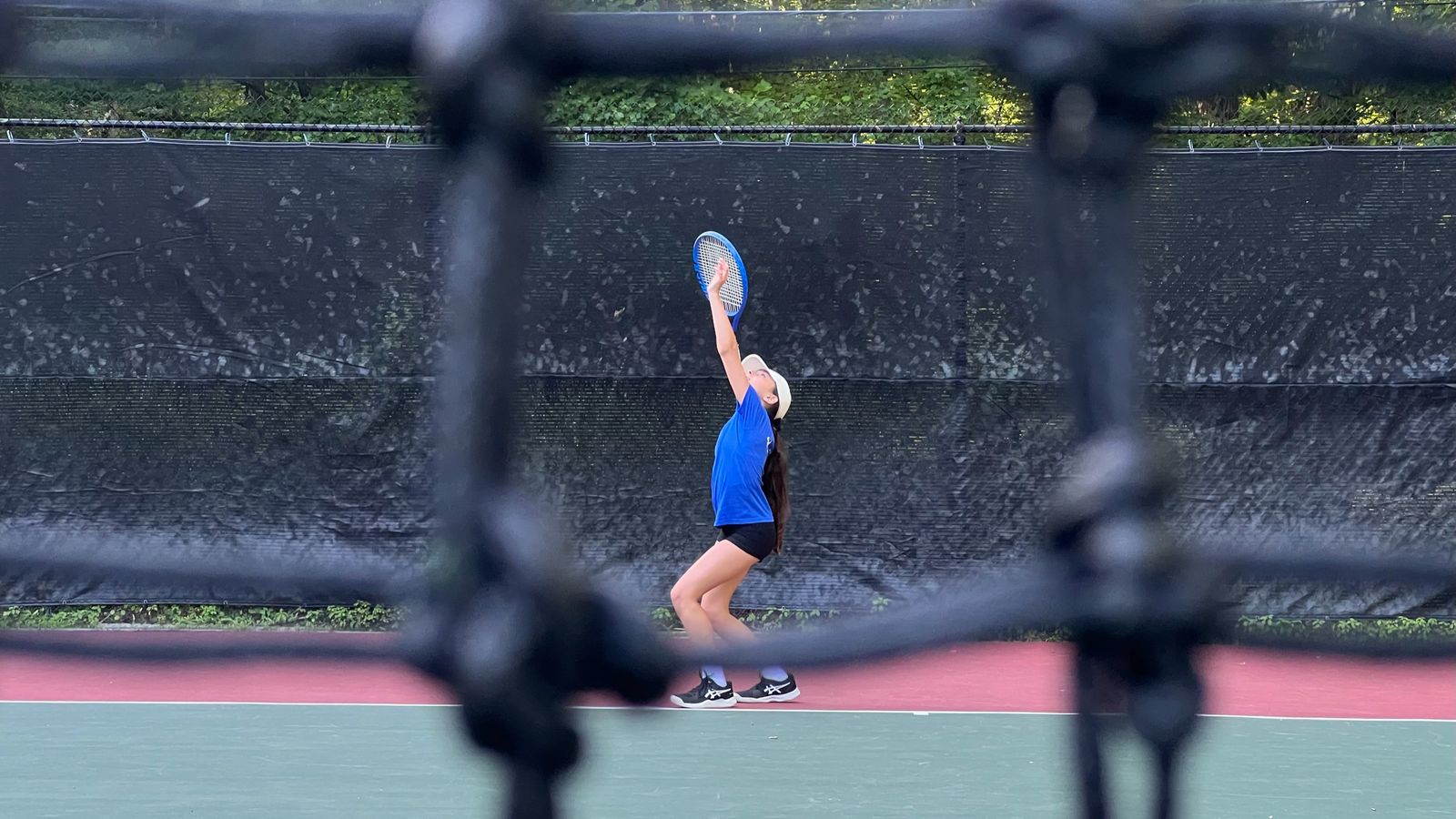 Junior players training on court